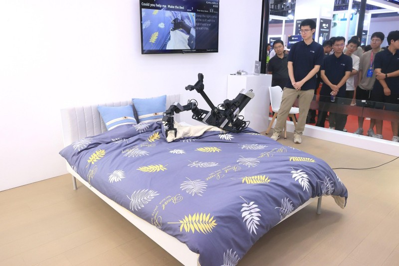 从“钢铁工人”到“温情伙伴” 机器人创新浪潮重塑未来生活图景 (2).JPG