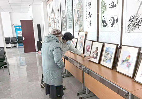 主题书画摄影展抒发居民家国情怀.jpg 主题书画摄影展抒发居民家国情怀.jpg